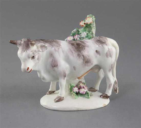 A Bow figure of a bull, c.1770-6, l. 16.5cm, restored tail, horns and leaves